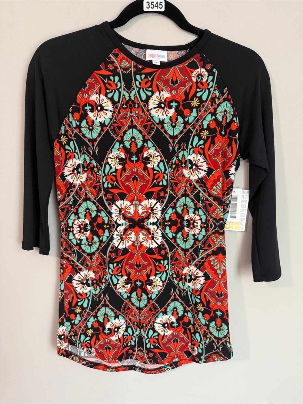 LuLaRoe Black Raglan Top with Red, Turquoise & White Medallion Print
